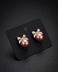 Elegant Pearl Bow Stud Earrings